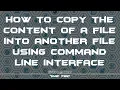 How to copy contents of a file into another file using command line interface