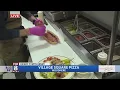 Kenny s eyeing up the menu at Village Square Pizza