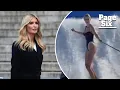 Ivanka Trump shows off her figure in plunging black swimsuit while surfing on family vacation