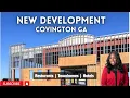 NEW DEVELOPMENT IN COVINGTON GA-SHOPPING CENTER RESTAURANTS TOWNHOUSES AND HOTELS