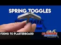 Spring toggles
