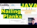 Codility Nailing Planks solution
