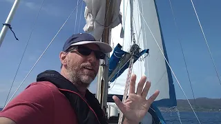 90) The sails are up and floppy