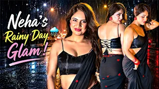 social media sensation neha malik turns up the heat in a black saree in the mumbai rain 