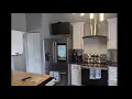 Diamond Intermediate Haskett Partial Overlay Painted White with Grey Stone Detail Glaze Kitchen