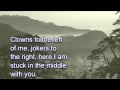Download Lagu Stealers Wheel ~ Stuck In The Middle With You [LYRICS]