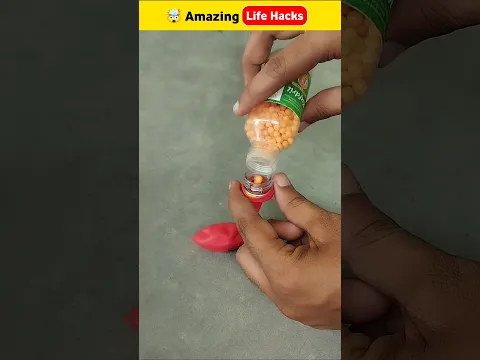 Made a slingshot using a bottle and a balloon. 😱