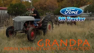 Grandpa Popin Wheelies with the tractor!