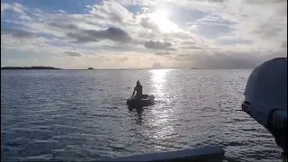 paddling in a small dinghy
