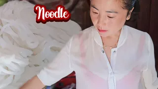 The noodles are being prepared by my mom. 
