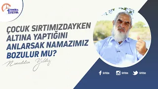 Çocuk sırtımızdayken altına yaptığını anlarsak namazımız bozulur mu?