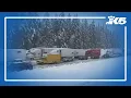 Drivers stranded on Snoqualmie Pass amid snowstorm
