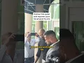 Andrew Tate spoke with reporters upon his arrival in the U S