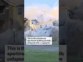 This is the moment an apartment building partially collapsed after a raging fire