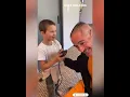 Robert Downey gets his head shaved and transformed into painted pump with the help of his cheldren