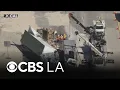 Big rigs collide on 210 Freeway in San Gabriel Valley spilling cargo across lanes
