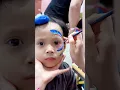 Blue shark face painting