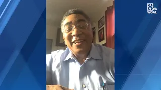 Former anchor Ron Martin congratulates Joe Calhoun on retirement