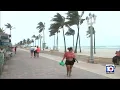 Wet windy weather impacting beachgoers along Hollywood Broadwalk