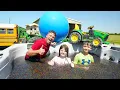 Download Lagu Playing in Orbeez and Crushing Tractor with Huge Water Balloon | Tractors for kids