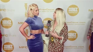 Bridgette B wears a flattering blue piece on the red carpet at the Xbiz Awards in Los Angeles CA