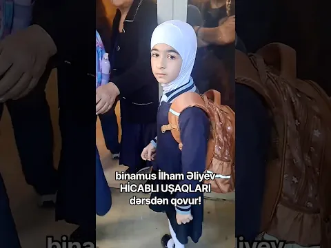 Hicablı qız oğraş İlham Əliyevə səsləndi. Hicablı məktəbli uşaqları rahat buraxın!