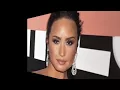 Demi Lovato is shows off her best body ever and her boobs are spilling out of a low cut swimsuit