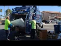 Las Vegas Peterbilt McNeilus Rear Loader Garbage Truck Packing on Bulky Items