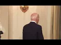 Joe Biden leaves and smiles to the sound of Linkin Park