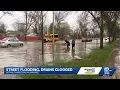 Milwaukee residents clear storm drains after flash flooding from severe storms