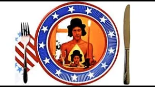 Arlo Guthrie with his guitar in the poster for the Alice's Restaurant game.