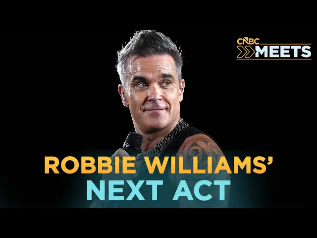 Video: After 30 Years, Robbie Williams Wants Something Bigger