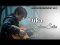 Lagu Luka Dalam Setia – Kisah Cinta yang Bertahan Meski Terluka (Official Lirik Video)