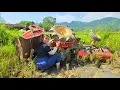Download Lagu Girl rescues and repairs an overturned tractor in a field.