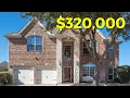 Inside a STUNNING 2 story home on HUGE LOT in the Spring Texas neighborhood of Louetta Lakes