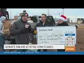 Two truckloads of food and a huge check from Corwin Ford