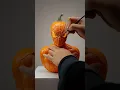 Carving Spider-man from pumpkin