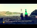 Story wa sebotol minuman di tepi pantai