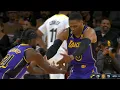 Patrick Beverley helps Russell Westbrook rock the baby after scoring on Jordan Clarkson