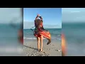 Jennifer Lopez enjoys the beach in skimpy red bikini and robe