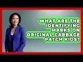 What Are The Identifying Marks On Original Cabbage Patch Kids - Collectible Dolls and Toys