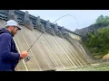 Fishing Below a Massive Dam For Anything That Will Bite
