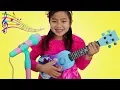 Download Lagu Jannie Plays with Disney Frozen Toy Guitar and Starts a Band