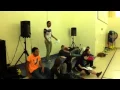 Lapeer High sophomore Noah Hirsch entertains elementary students with Mitosis rap