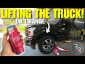 FIRST LIFT OF THE TRUCK ON THE SINGLE POST LIFT 2017 F-150 SERVICE OIL CHANGE