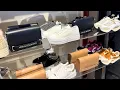 Armani Exchange sneakers and handbags in a retail store