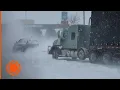 Semi truck pulled out of snowy hill in Wyoming AccuWeather