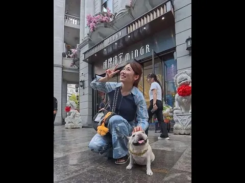 The dog skated on Dog Walking Street, met a girl, and got kisses and hugs—it was so much fun!