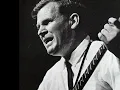 SITTING ON TOP OF THE WORLD (1964) by Doc Watson