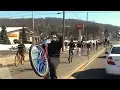 Kids on bicycles taunt cars on busy roadway